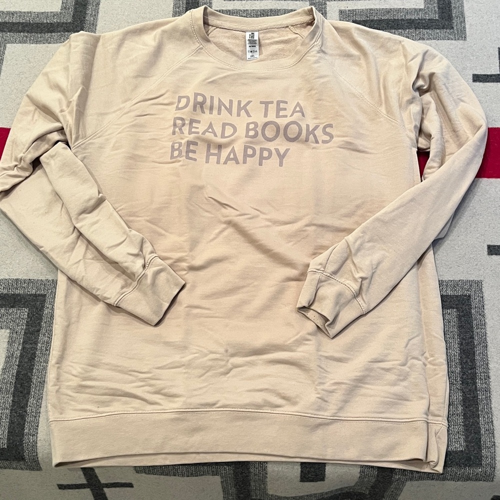 Beige Sweatshirt with words to live by! perfect for any book lover!